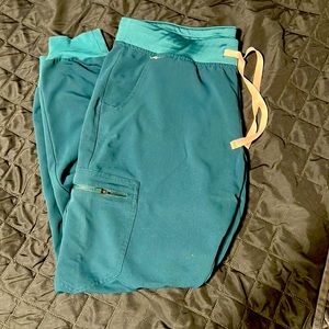 Large teal fig scrub bottoms. Brand new just didn’t fit.